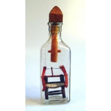 637 - Bucksaw and Saw Horse in bottle
