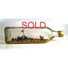 696 - World War II Battle Scene Ship in bottle - SOLD